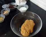 A picture of step 5 of Biscuits Meethi (Swiss roll style).