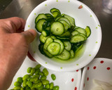 A picture of step 1 of New Onion and Cucumber Salad.