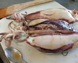 Foto del paso 11 de la receta: Calamares rellenos de arroz y langostinos
