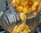 A picture of step 1 of Mango Peach Slush.