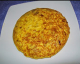 Foto del paso 13 de la receta: Tortilla de patata rellena de pavo y queso