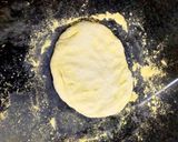 A picture of step 3 of Veg. Pizza.