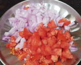 A picture of step 3 of Moong Dal Appe with vegetables.