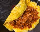 A picture of step 6 of Japanese Egg Wrapped Tomato Chicken Rice (Omu Rice).