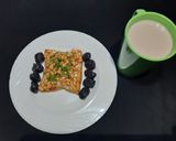 A picture of step 5 of Beans on scrambled egg on toast.