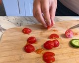 A picture of step 3 of Bagel with Tomato and Cucumber🥯🥒🍅.