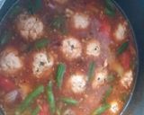 A picture of step 8 of American choupsey with chicken balls.