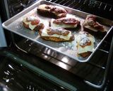 A picture of step 13 of Chicken Parmesan With Spaghetti and Garlic Bread.