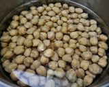 A picture of step 1 of Shahi Chhole Bhature prepared with garam masala.