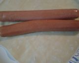 A picture of step 4 of Hotdog Egg rolls with sweet and spicy sauce.