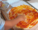 Foto del paso 4 de la receta: Pizza preparada por la pequeña de la casa