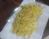 Foto del paso 3 de la receta: Pechuga de pollo adobada al limón a la plancha con papas fritas