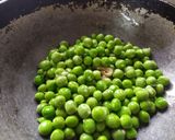 A picture of step 2 of Green peas curry.