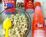 A picture of step 4 of Besan coated mazedar masala kaju.