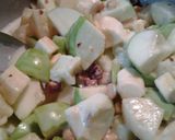 A picture of step 2 of Apple pineapple banana salad.