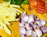 A picture of step 1 of Stir fried potatoes capsicum.