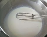 A picture of step 4 of Orange Marmalade Icecream.