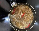 Hình bước làm 4 của món Cá cơm kho tiêu
