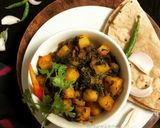 A picture of step 7 of Paneer Kulfa Saag Stir Fry.