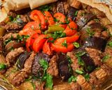 صورة لخطوة 8 من وصفة الملضوم بالباذنجان🍆🍅🧄🧅