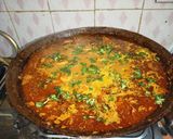 A picture of step 12 of Kadhai chicken.