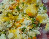 Foto del passaggio 4 della ricetta Tortini patata piselli e carota filanti