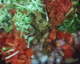 A picture of step 2 of Indian style cheese paneer veg pizza paratha.