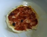 Foto del paso 2 de la receta: Panqueque flambeado con mermelada de arándanos y yogurt