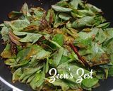 A picture of step 2 of Andhra Gongura Chutney.