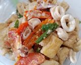 Foto langkah ke 7 dari resep Cumi cumi oseng tahu.