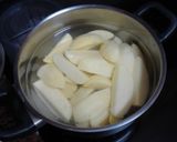 Foto del paso 3 de la receta: Chuletas de cerdo a la plancha con papas salteadas y pimientos asados