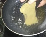 A picture of step 2 of Dhaniya ki panjiri.