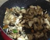 A picture of step 2 of Garlic Mushrooms Green Peas and Sweet-Corn Fried Rice.
