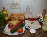Foto del paso 4 de la receta: Merluza al horno con patatas panaderas