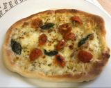 A picture of step 6 of Neapolitan pizza (including the dough).