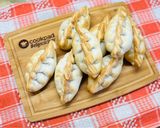 Foto del paso 4 de la receta: Empanadas de pollo, salsa blanca y espinaca