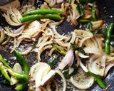 A picture of step 2 of Vankaaya Sanagala curry (brinjal black chana curry).