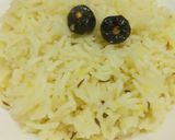 A picture of step 12 of Zeera Rice.