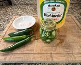 A picture of step 1 of Pickled Serrano peppers.