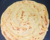 A picture of step 4 of Mong masoor ki dal with rice/paratha.