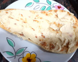 Foto del paso 5 de la receta: Pan naan con hummus, secreto ibérico y cebolla