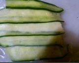 A picture of step 2 of Tuna and mayonnaise sandwich, cheese, pickles.