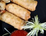 A picture of step 7 of Chicken cheese spring roll.