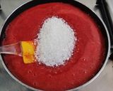 A picture of step 3 of Strawberry milk shake with dollop of strawberry ice cream.