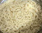A picture of step 1 of Schezwan Egg Sausage Noodles.