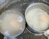A picture of step 4 of Veggie fritters and poached egg in a bun.
