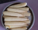 A picture of step 1 of Veg. Babycorn in curd.