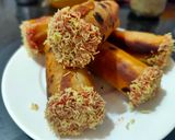 A picture of step 8 of Rotli cigars using leftover farsan after Diwali.