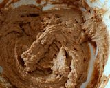 Foto del passaggio 4 della ricetta Tartufini al caffè e mascarpone con smarties colorati al cioccolato