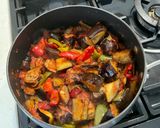 A picture of step 8 of Sausages with roasted vegetables in a tomato sauce.